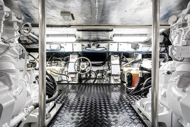 Norma Jean Yacht Photos Pics Engine room of 2007 Sunseeker Predator 82 yacht, featuring advanced mechanical systems.