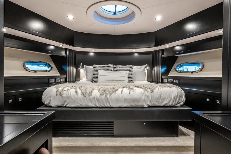 Norma Jean Yacht Photos Pics Luxurious bedroom interior of 2007 Sunseeker Predator 82 yacht with modern design.