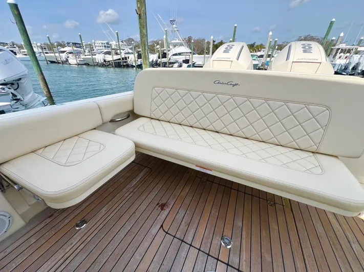  Yacht Photos Pics 2022 Chris-Craft Calypso 30 boat with elegant seating and teak deck at marina.
