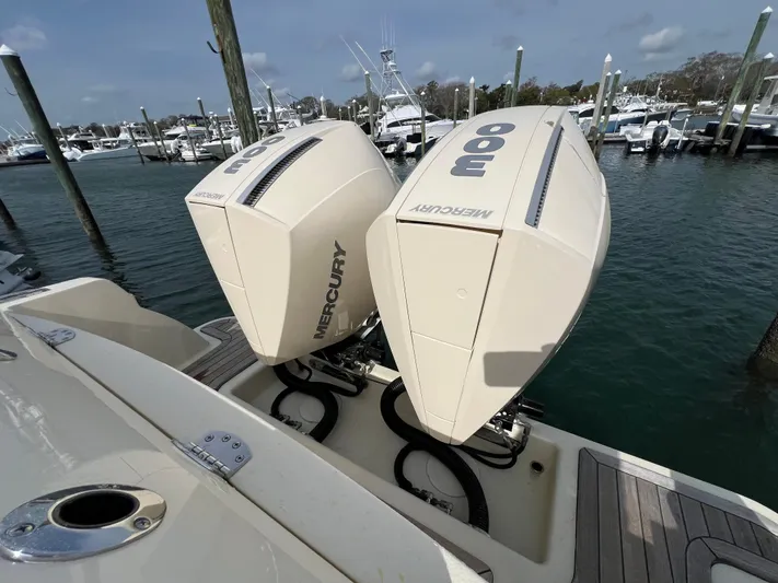  Yacht Photos Pics 2022 Chris-Craft Calypso 30 with twin Mercury 300 outboard engines at marina.