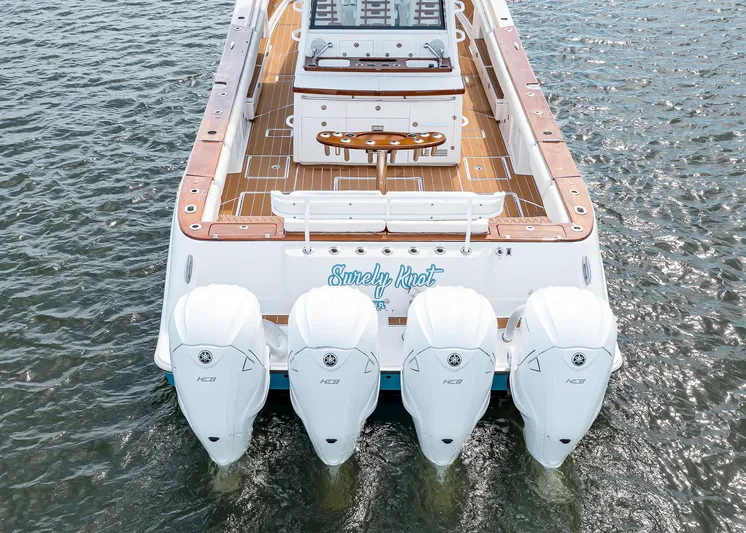  Yacht Photos Pics 2020 HCB Suenos boat with four powerful outboard engines on the water.