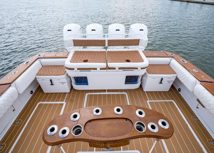  Yacht Photos Pics 2020 HCB Suenos boat deck with seating, rod holders, and ocean view.