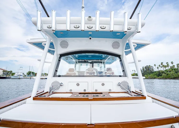  Yacht Photos Pics 2020 HCB Suenos boat with sleek design, spacious deck, and modern amenities on a calm waterway.