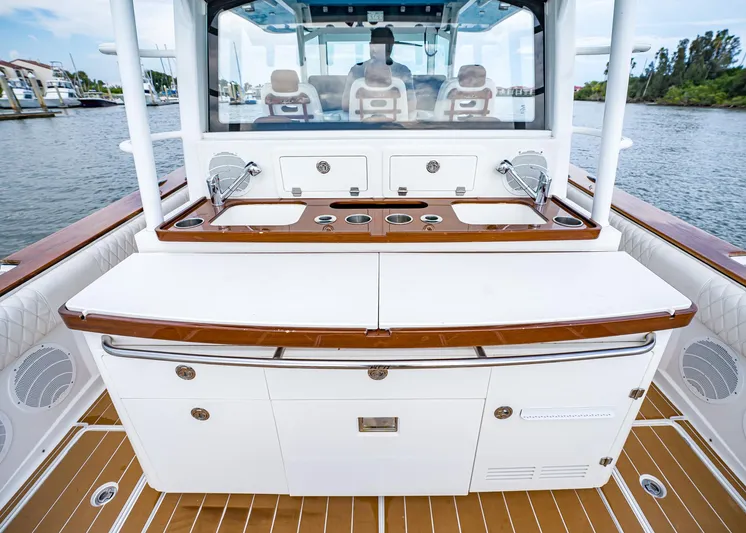  Yacht Photos Pics 2020 HCB Suenos boat interior with luxurious seating and modern amenities on a serene waterway.