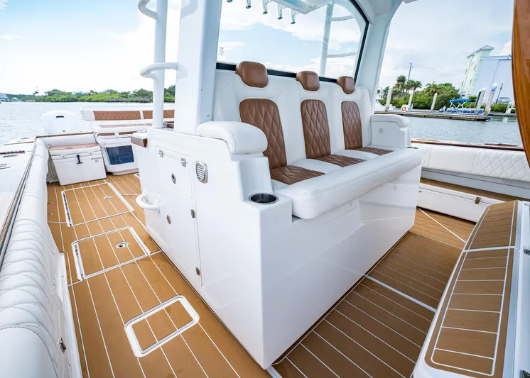  Yacht Photos Pics 2020 HCB Suenos boat interior with luxurious seating and teak flooring.