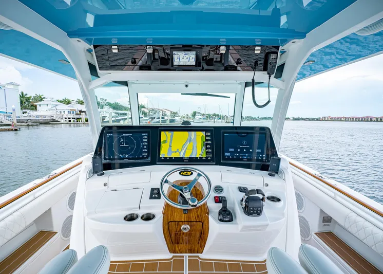  Yacht Photos Pics 2020 HCB Suenos boat helm with advanced navigation displays and controls on a sunny day.