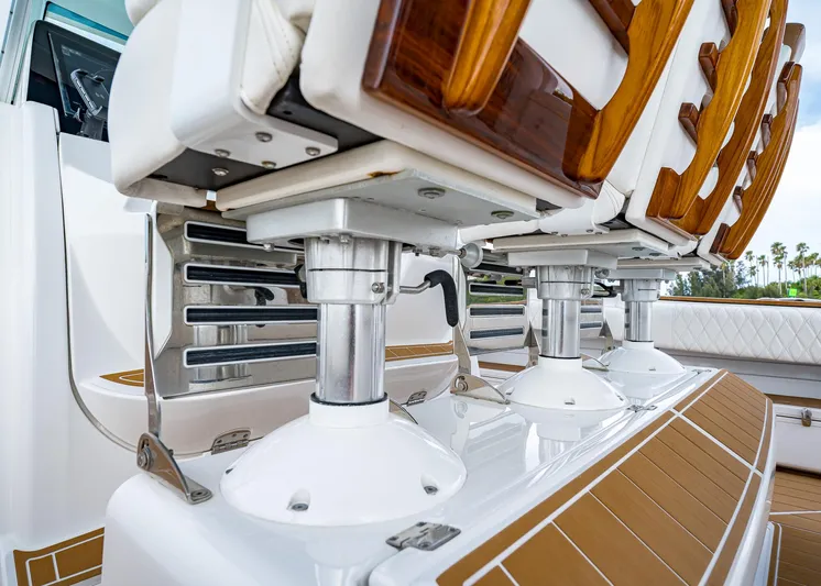  Yacht Photos Pics Luxury seating on 2020 HCB Suenos boat with polished metal and wood accents.