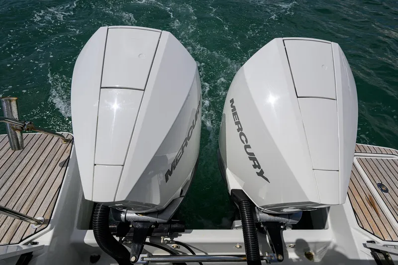 Don't Wake Me Yacht Photos Pics Twin Mercury outboard engines on a 2022 Jeanneau NC Weekender 1095 Fly boat.