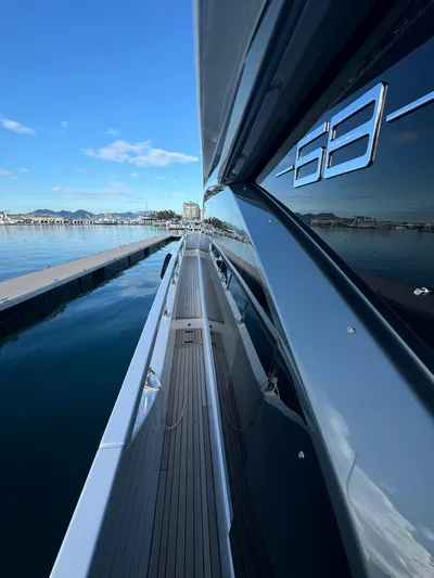  Yacht Photos Pics 2024 Azimut Fly 68 yacht docked, showcasing sleek design and modern features.