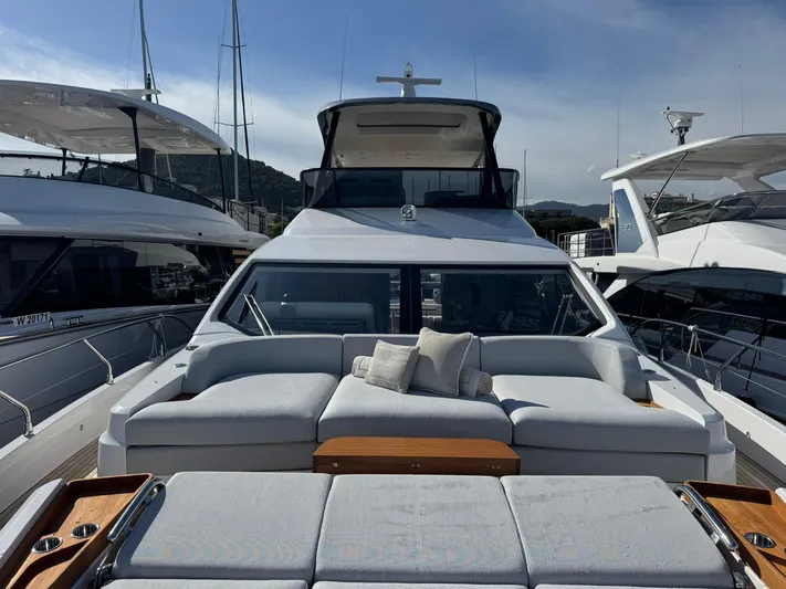  Yacht Photos Pics 2024 Azimut Fly 68 yacht with luxurious deck seating and modern design.
