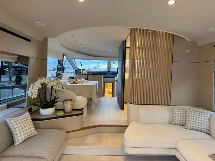  Yacht Photos Pics Luxurious interior of 2024 Azimut Fly 68 yacht with elegant seating and dining area.