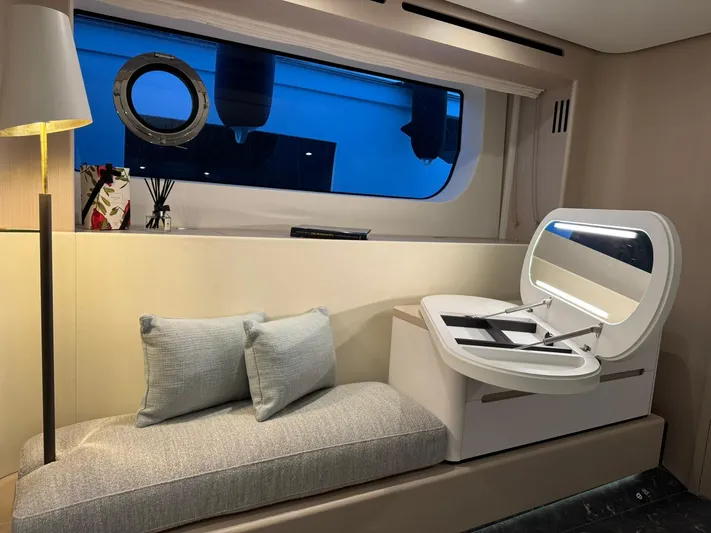  Yacht Photos Pics Luxurious interior of 2024 Azimut Fly 68 yacht with modern seating and window view.