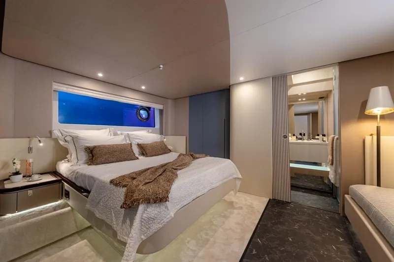  Yacht Photos Pics Luxurious bedroom interior of 2024 Azimut Fly 68 yacht with modern design and elegant decor.