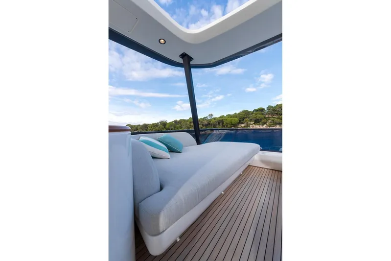  Yacht Photos Pics Luxurious 2024 Azimut Fly 68 yacht with elegant deck lounge area.