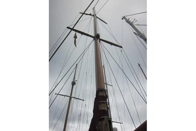 Yacht Photos Pics Tall ship masts and rigging against a cloudy sky, Custom Southern 1962 model.