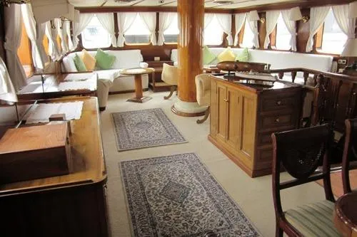  Yacht Photos Pics Luxurious 1962 Custom Southern yacht interior with elegant woodwork and plush seating.