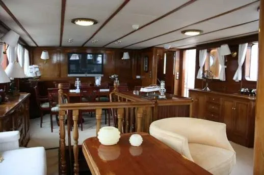  Yacht Photos Pics Luxurious 1962 Custom Southern yacht interior with elegant wood paneling and comfortable seating.