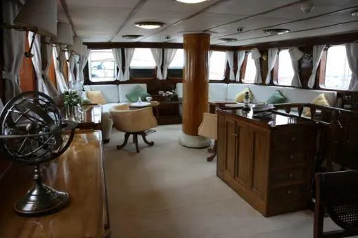  Yacht Photos Pics Luxurious 1962 Custom Southern yacht interior with elegant wood furnishings and plush seating.