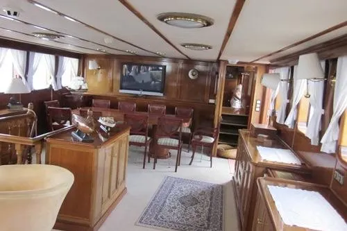  Yacht Photos Pics Luxurious 1962 Custom Southern yacht interior with elegant wood paneling and plush seating.