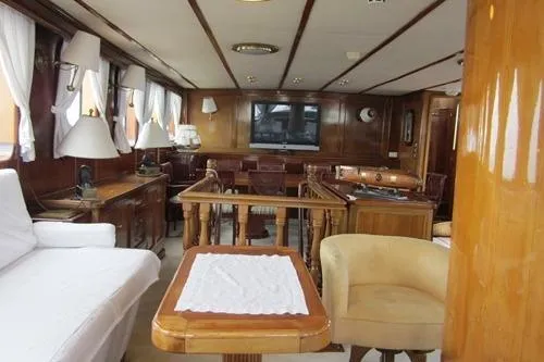  Yacht Photos Pics Luxurious 1962 Custom Southern yacht interior with elegant wood furnishings and modern amenities.