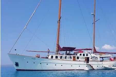  Yacht Photos Pics Vintage 1962 Custom Southern yacht with two masts on calm blue sea.