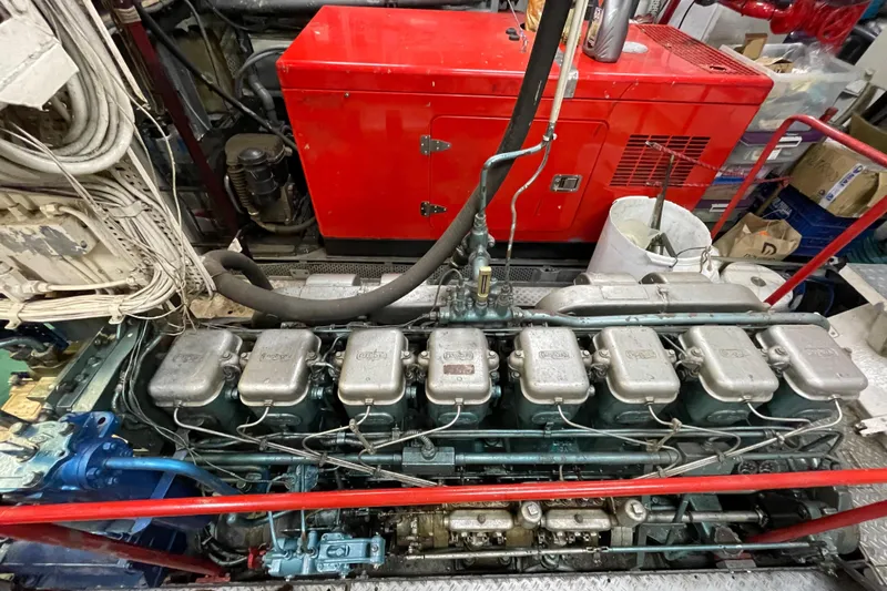  Yacht Photos Pics 1962 Custom Southern engine with red generator, detailed mechanical components.