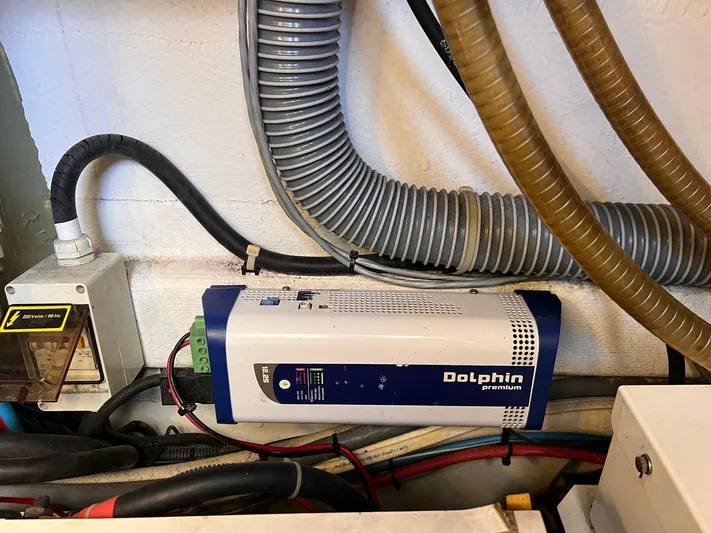  Yacht Photos Pics Dolphin Premium charger in 2010 Beneteau Monte Carlo 47 engine room.