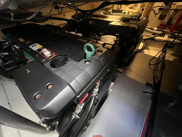  Yacht Photos Pics Engine room of 2010 Beneteau Monte Carlo 47 yacht, showcasing mechanical components.