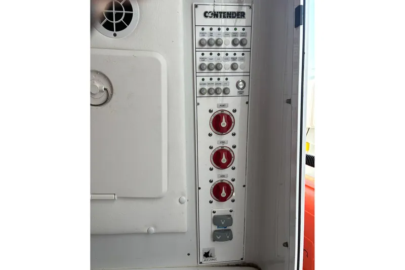  Yacht Photos Pics Control panel of a 2019 Contender 28 Sport boat with switches and dials.