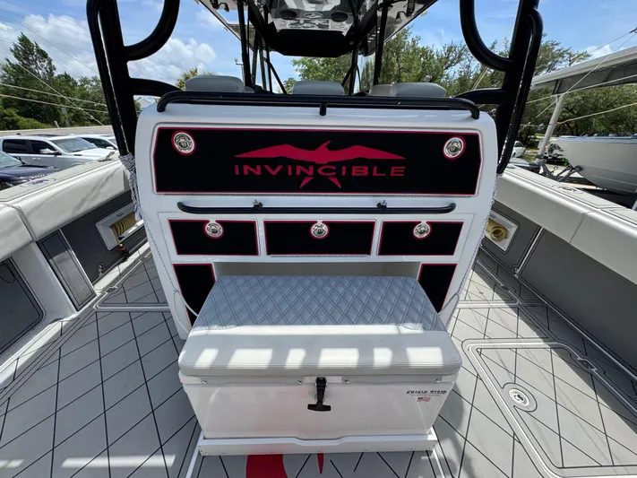  Yacht Photos Pics 2020 Invincible 40 Catamaran interior with storage compartments and seating.