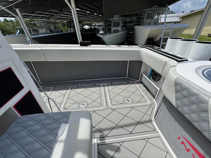  Yacht Photos Pics Interior view of 2020 Invincible 40 Catamaran, featuring sleek seating and modern design elements.