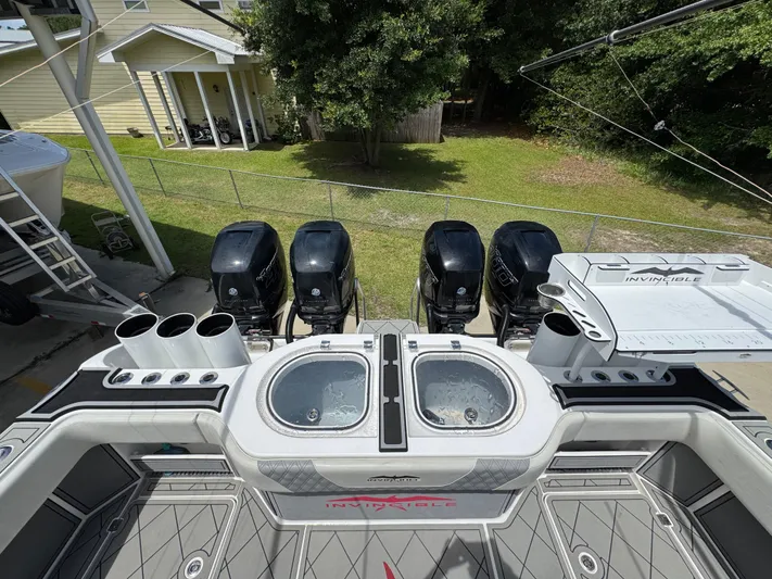  Yacht Photos Pics 2020 Invincible 40 Catamaran with four powerful outboard engines and dual livewells.