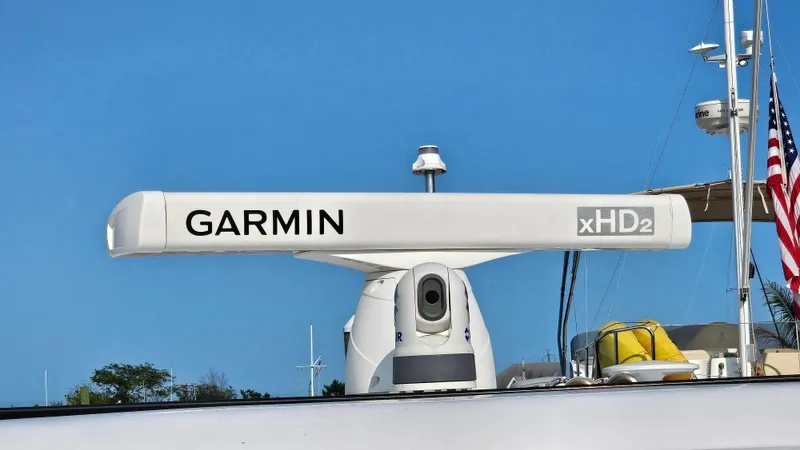  Yacht Photos Pics Garmin xHD2 radar on 2021 Regal 38 SAV boat against clear blue sky.