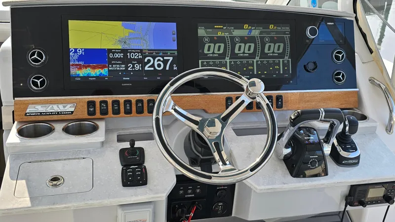  Yacht Photos Pics Control panel of 2021 Regal 38 SAV boat with advanced navigation displays.
