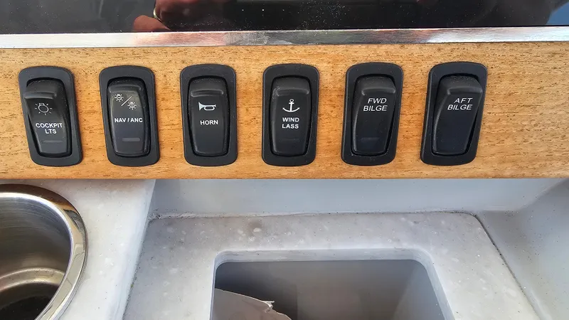 Yacht Photos Pics Control panel of 2021 Regal 38 SAV boat with labeled switches.