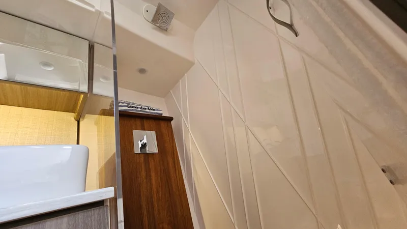  Yacht Photos Pics Interior of 2021 Regal 38 SAV boat, featuring modern bathroom design.