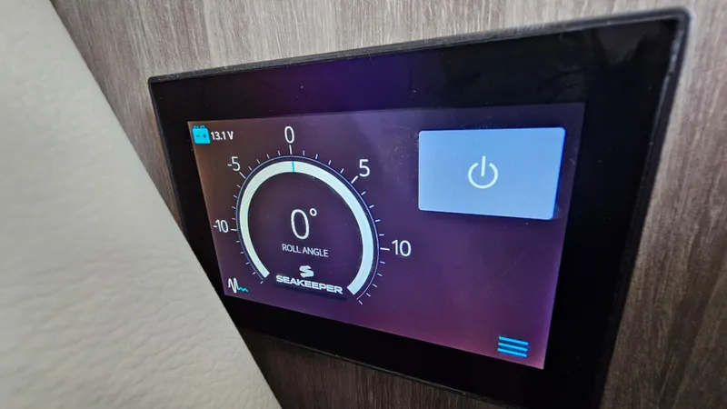  Yacht Photos Pics Seakeeper control panel on 2021 Regal 38 SAV boat, displaying roll angle and power button.