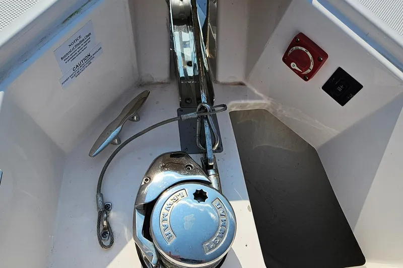  Yacht Photos Pics Anchor system on 2021 Regal 38 SAV boat deck, featuring winch and cleat.