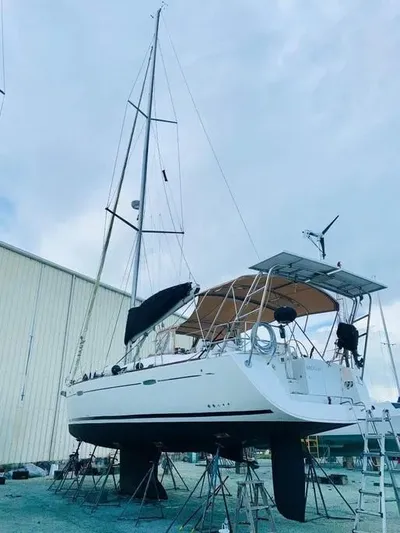 Karuna Ss Yacht Photos Pics 2007 Beneteau 49' Cruiser sailboat on stands, ready for maintenance.