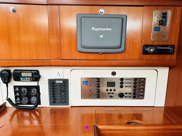 Karuna Ss Yacht Photos Pics Control panel of a 2007 Beneteau 49' Cruiser with Raymarine navigation system.