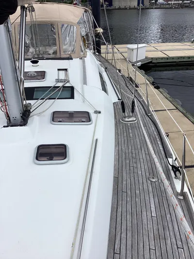 Karuna Ss Yacht Photos Pics 2007 Beneteau 49' Cruiser sailboat docked, showcasing deck and cabin details.