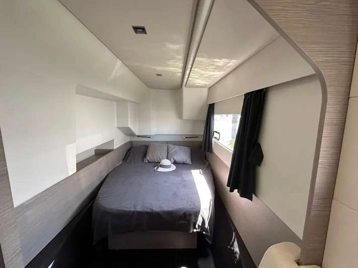 Vie Pure Yacht Photos Pics Modern bedroom interior of 2021 Fountaine Pajot MY4.S yacht, featuring sleek design and natural light.