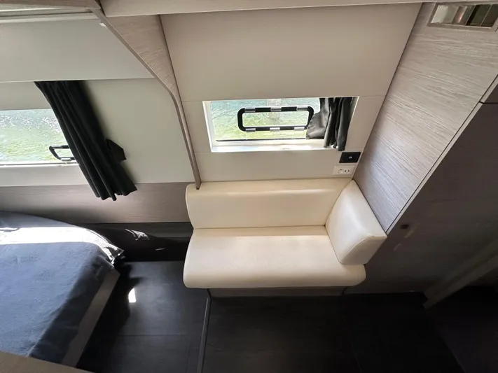 Vie Pure Yacht Photos Pics Interior of 2021 Fountaine Pajot MY4.S yacht with seating and window view.