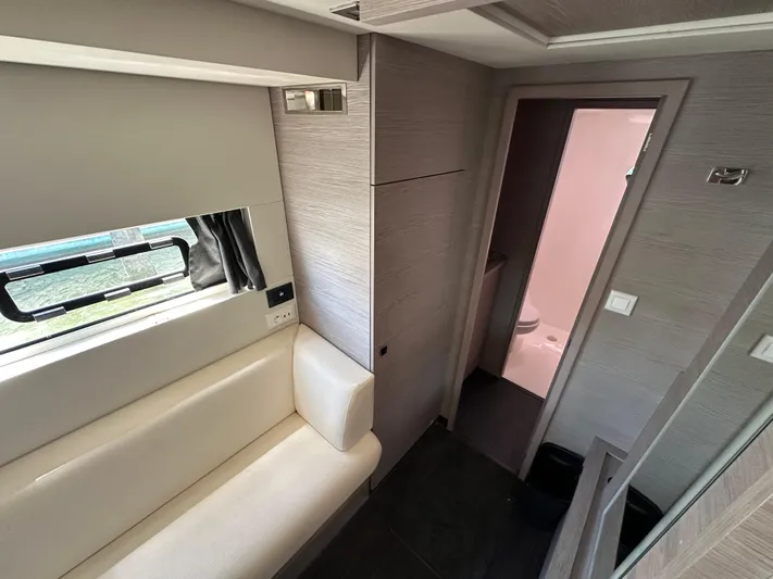Vie Pure Yacht Photos Pics Interior of 2021 Fountaine Pajot MY4.S yacht, featuring modern seating and bathroom.