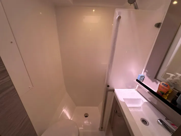 Vie Pure Yacht Photos Pics Bathroom interior of 2021 Fountaine Pajot MY4.S yacht, featuring modern fixtures and compact design.