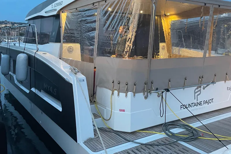 Vie Pure Yacht Photos Pics 2021 Fountaine Pajot MY4.S yacht docked, featuring covered deck and modern design.