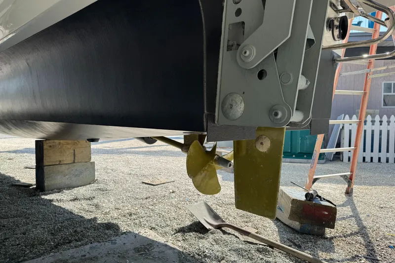 Vie Pure Yacht Photos Pics 2021 Fountaine Pajot MY4.S yacht propeller and rudder detail in a shipyard setting.