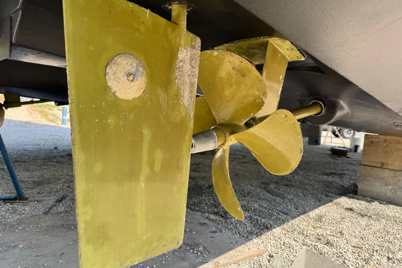 Vie Pure Yacht Photos Pics Propeller and rudder of 2021 Fountaine Pajot MY4.S catamaran on dry dock.