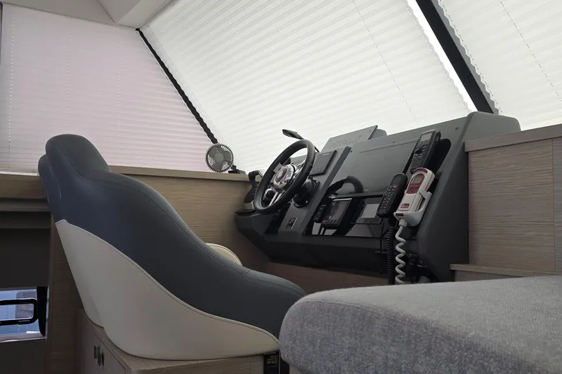 Vie Pure Yacht Photos Pics 2021 Fountaine Pajot MY4.S yacht helm with modern controls and comfortable seating.