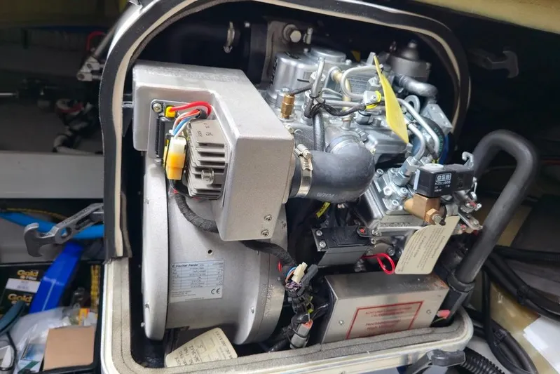 Vie Pure Yacht Photos Pics Engine compartment of a 2021 Fountaine Pajot MY4.S motor yacht, showcasing mechanical components.